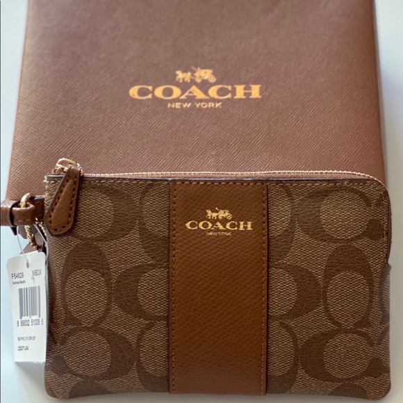 Coach Handbags - Authentic Signature COACH wristlet